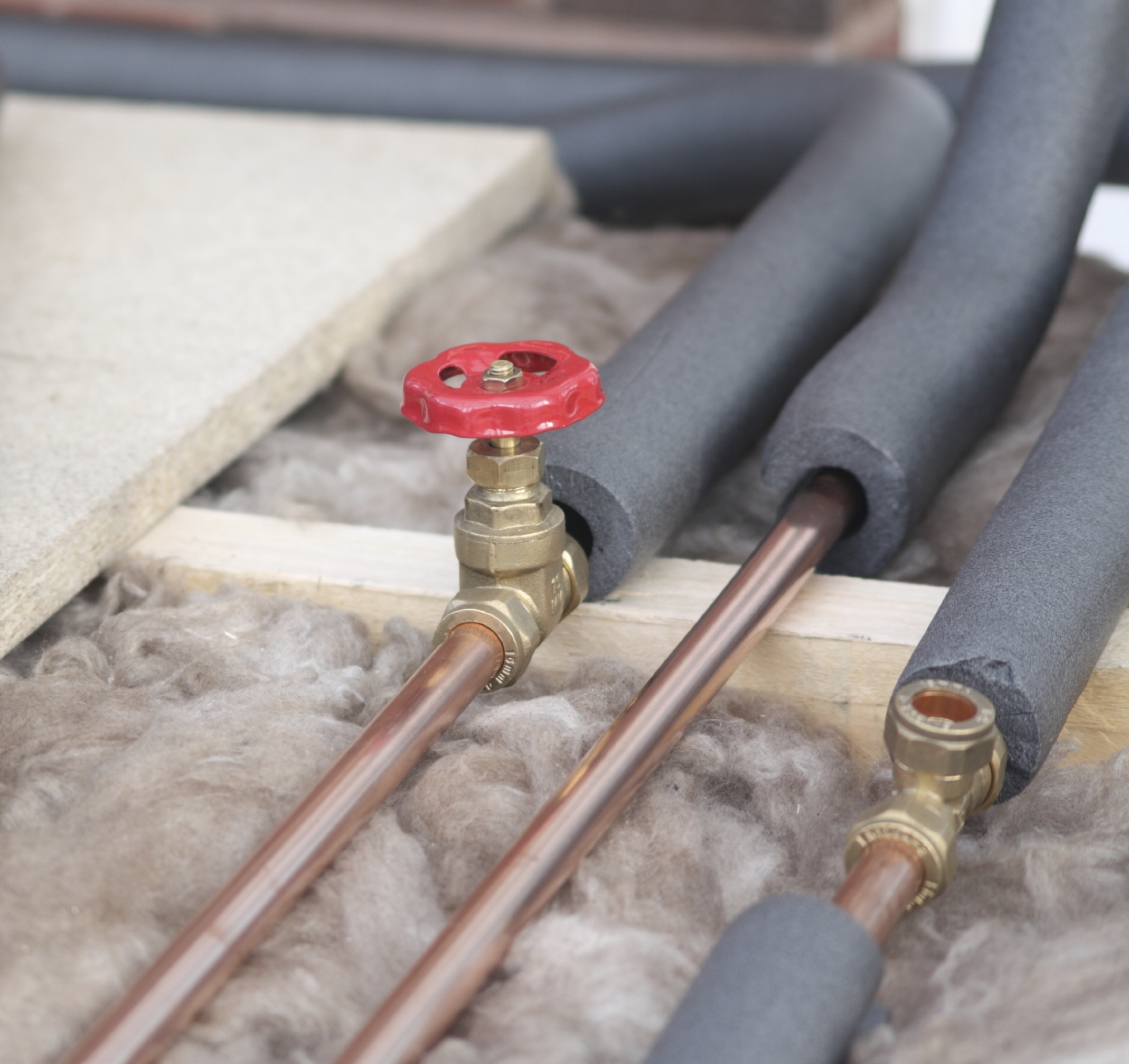 Can Pink Insulation Touch Hot Water Pipes  