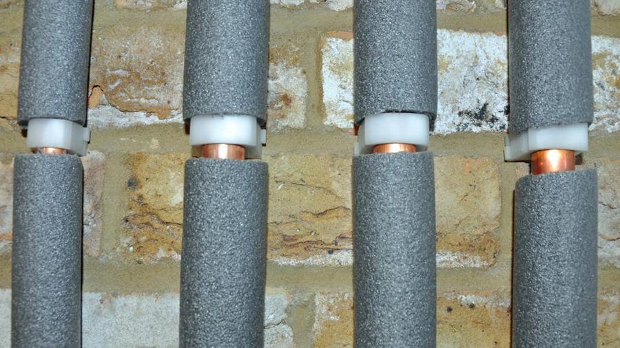Can Pink Insulation Touch Hot Water Pipes